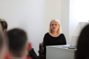 The executive director of "Community Building Mitrovica" holds a lecture for the students of AAB College