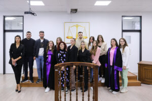 Students of the Faculty of Law conduct a simulated court session in the Courtroom of the AAB College
